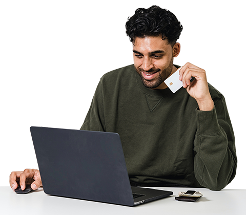 A man is checking his online credit status using a laptop.