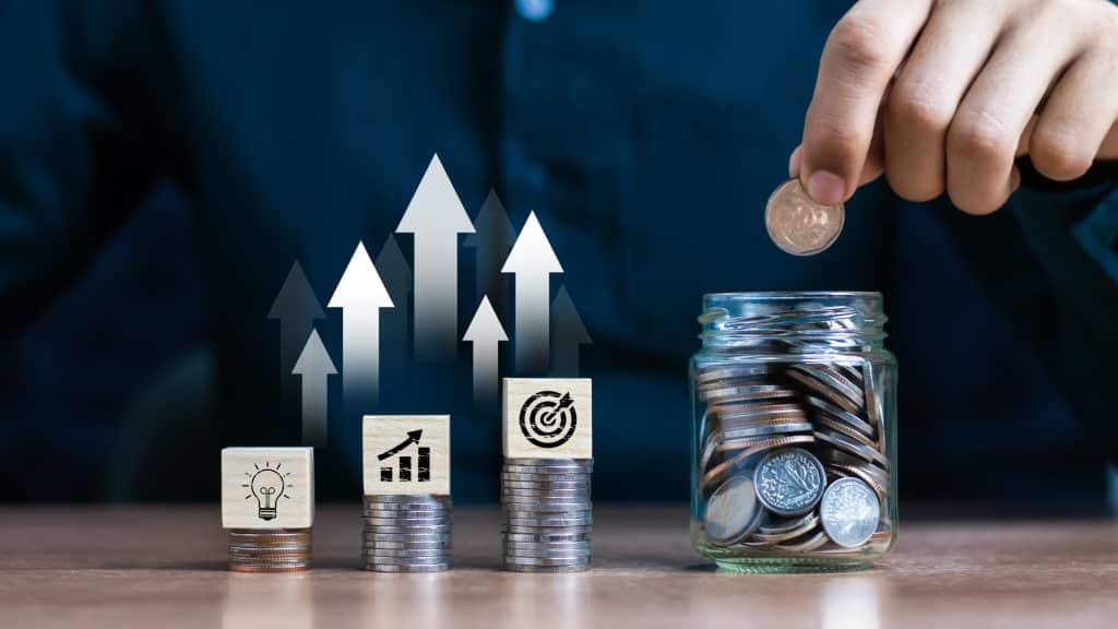 investment and savings growth with stacked coins
