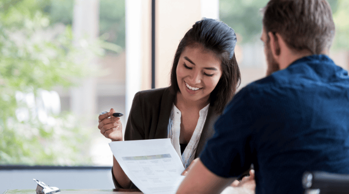 loan officer reviewing financial documents
