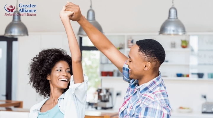 couple celebrating home loan approval and new beginnings