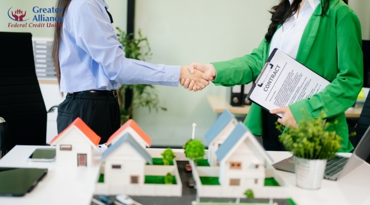 mortgage approval handshake with home loan specialist