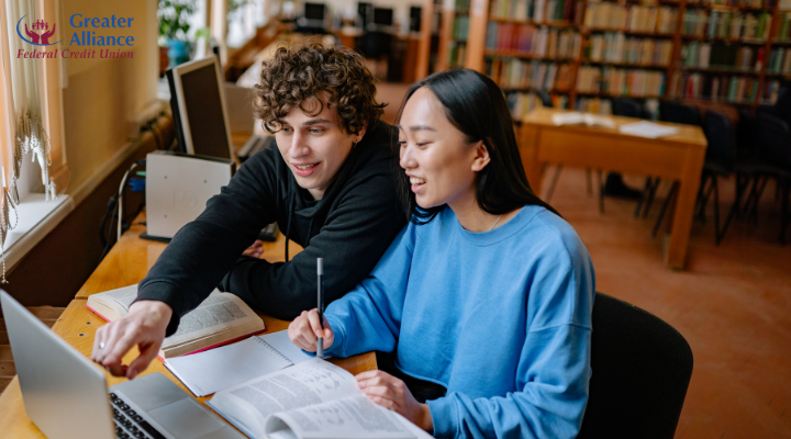 college students studying together with a laptop